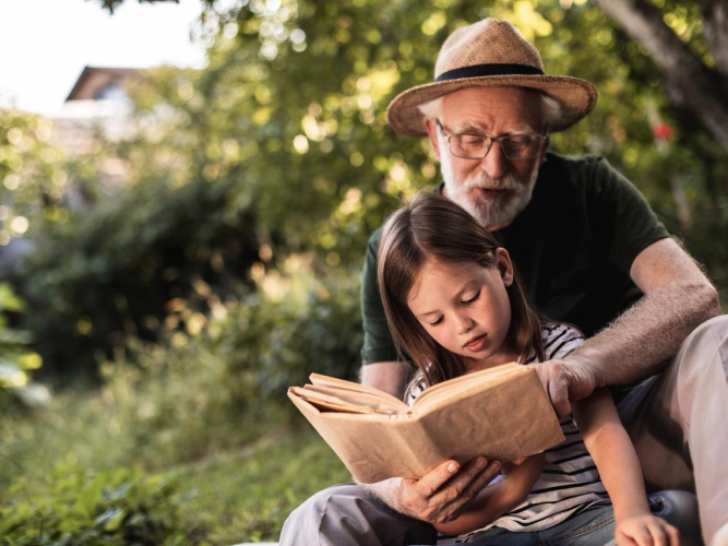 adult reading with child